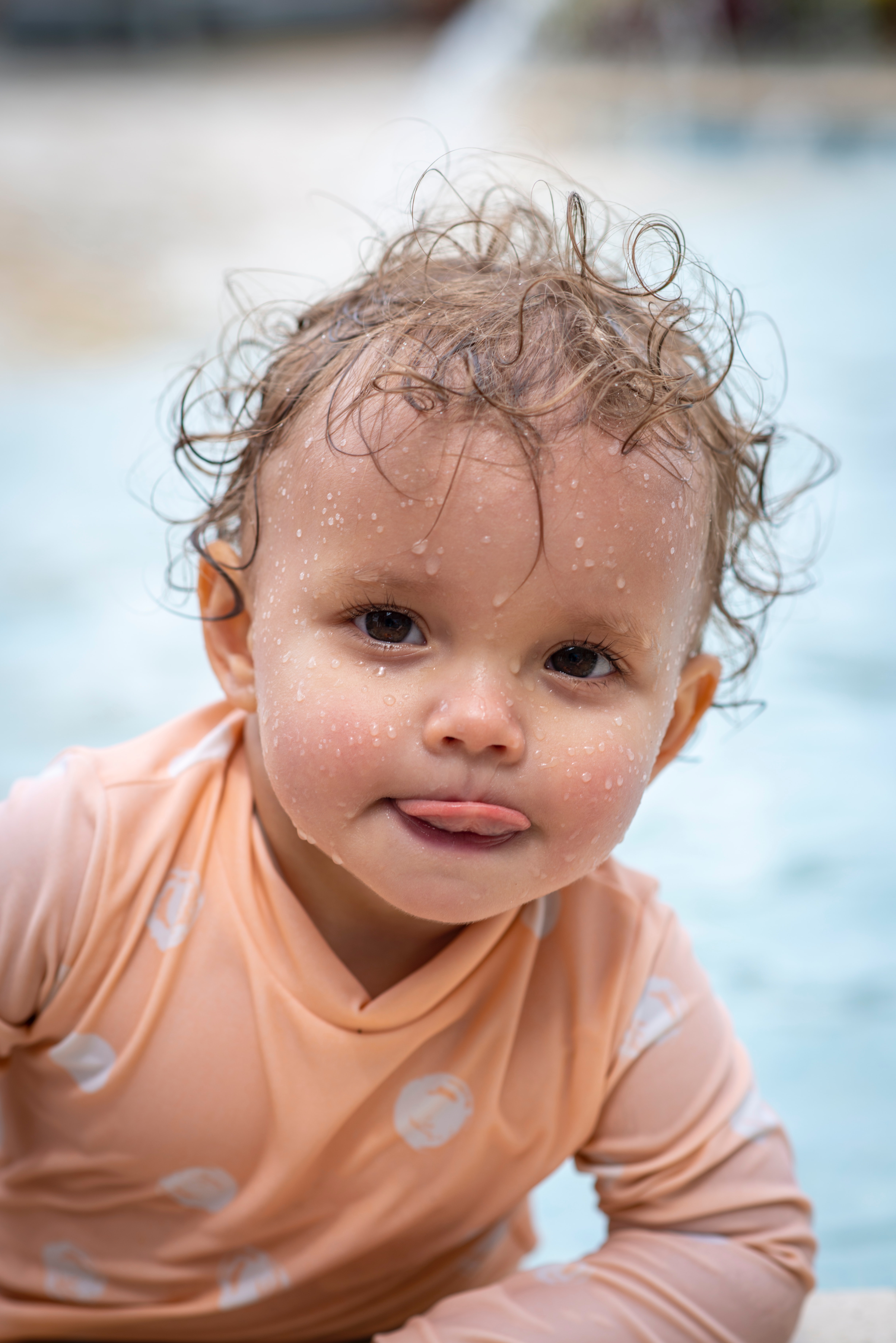 How to potty train toddler early - Toddler in swimming pool